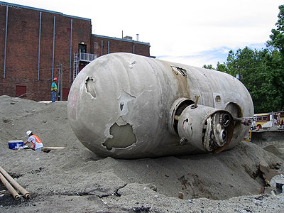 [Gas tank dug up at a construction site]